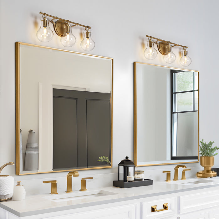 Phospa 3-Light Gold Clear Glass Vanity Light