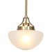 Modern pendant light with a frosted glass shade and gold frame, emitting a warm, soft glow.